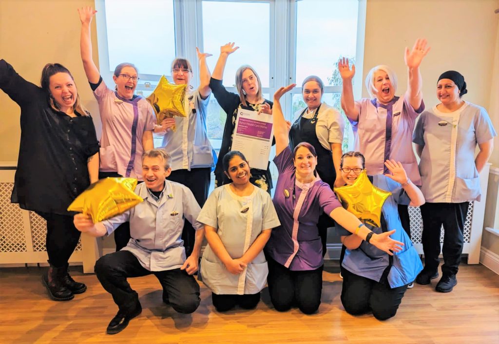 Byron House staff celebrate their Outstanding CQC rating