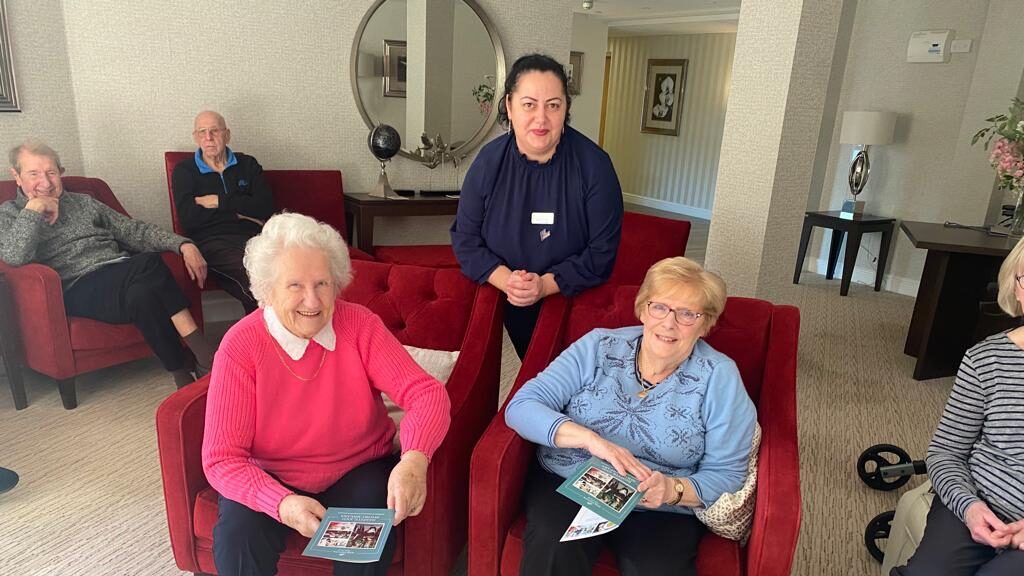 Ioana Morar, deputy manager of White Lodge, (centre) with residents at Blunsdon Court retirement apartments