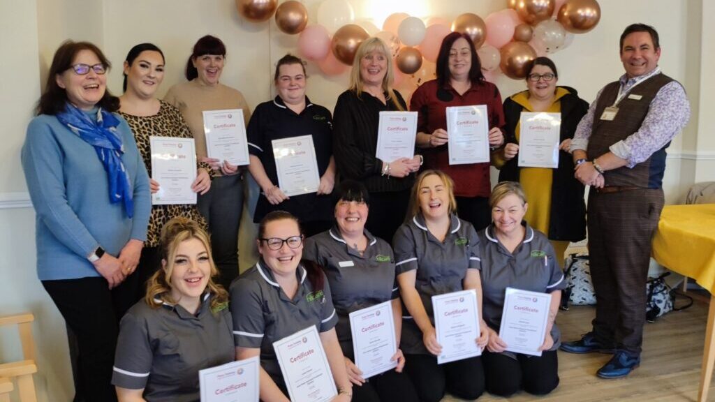 Northeast carers show off their CHAP certificates