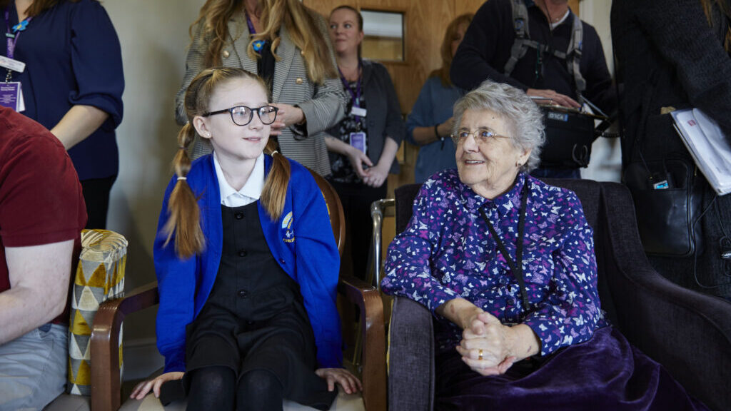Photographed here is Betty, who suffers with Alzheimer’s disease which effects her short term memory, but this is helped by the music sessions that Intergenerational Music Making project provide at her home. Intergenerational Music Making aims to build bridges across generations, sectors and amongst professionals to create stronger, more cohesive communities. Using the power of music we bring children, older people and communities together to create and connect. Through our projects, training and research we aim to encourage a sense of belonging to provide spaces for voices to be heard and celebrated. Our work aids the improvement of mental and physical wellbeing and reducing feelings of loneliness and isolation.(Photo by Rebecca Jane Callaby/Comic Relief)