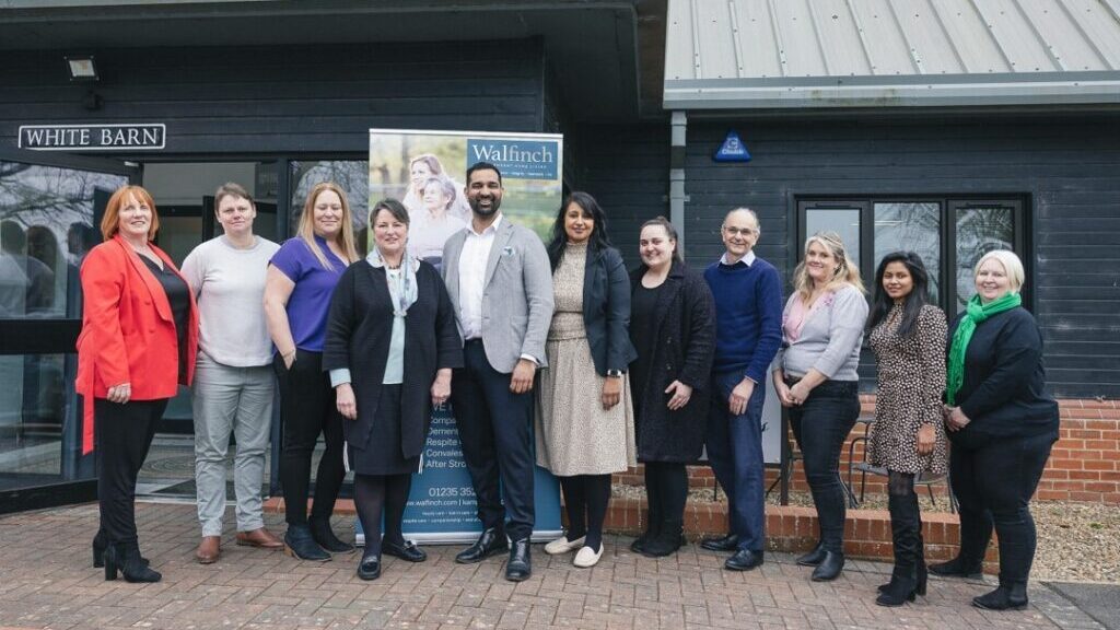 Chief executive, Amrit Dhaliwal, with his team at the new Walfinch offices in Oxfordshire