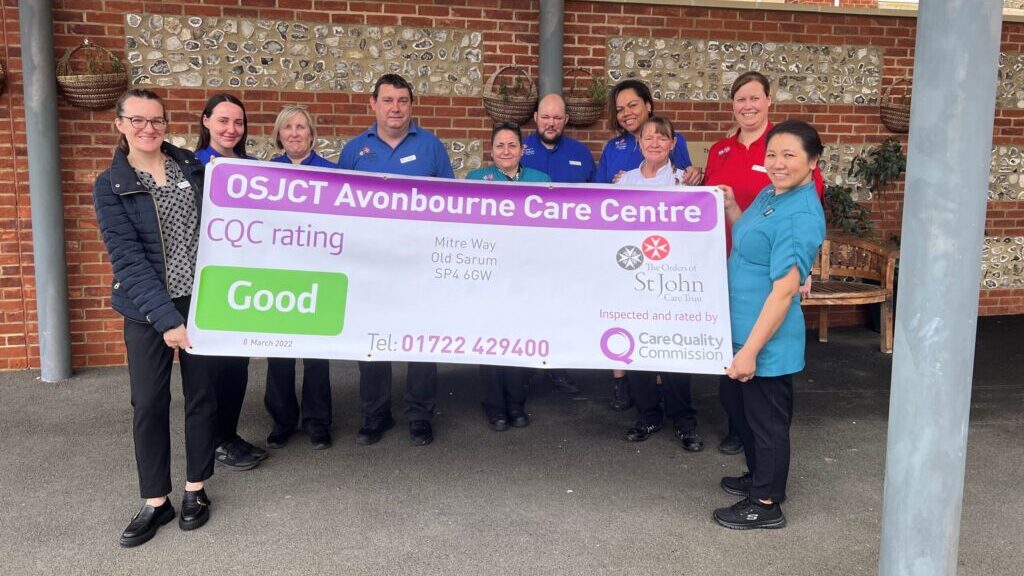 Avon Court care team show off their new Good rating banner
