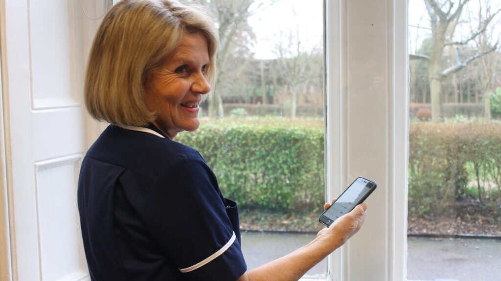 A carer tries out the Log My Care platform