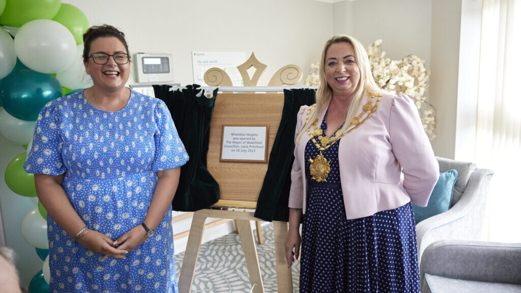 Clare Heaton, home manager at Wheldale Heights and Mayor of Wakefield, Councillor Josie Pritchard unveil a plaque to launch the home