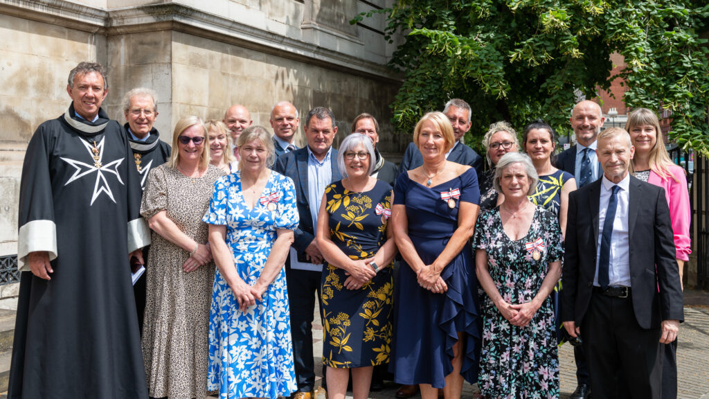 St Johns Day investees and guests at the ceremony on 23 June