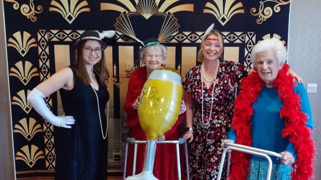 Staff and resident donned pearls and feathers for The Great Gatsby screening at Perry Manor care home