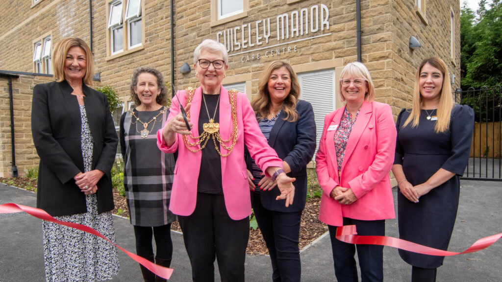 The Lord Mayor of Leeds Cllr Al Garthwaite opening Guiseley Manor with the New Care team