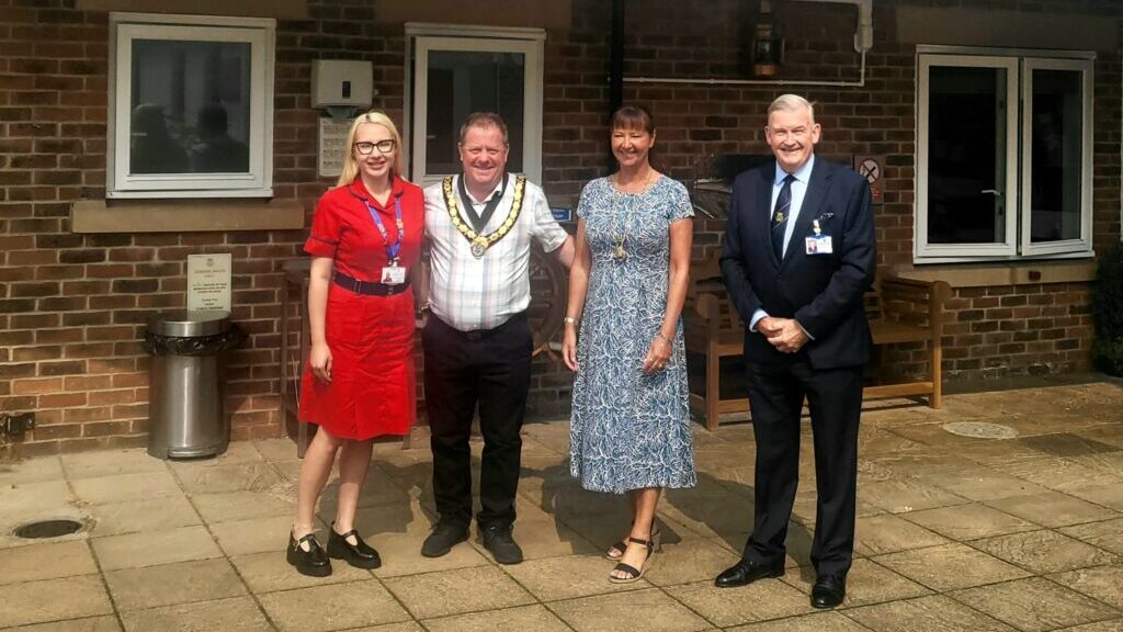 Councillor Eddy Humphreys, The Mayor of the Borough of Reigate and Banstead (second left) at the opening of newly refurbished Belvedere House