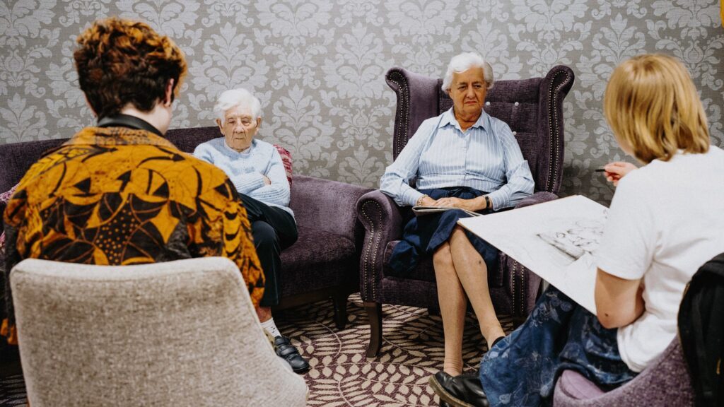 Ladies sit for their portraits at Dormy Care Communities' Brockington House