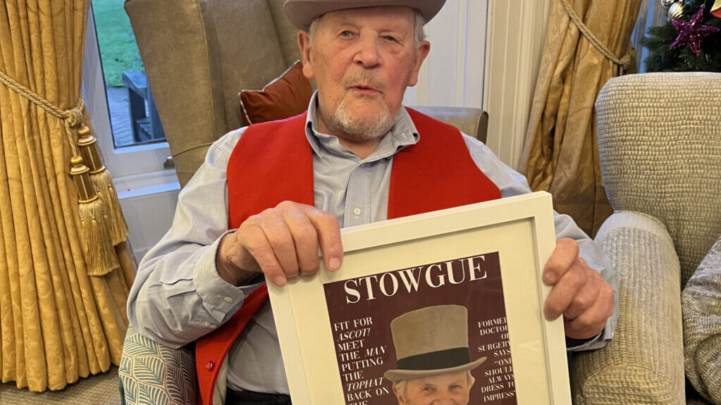 A Manson House resident shows off his cover shot in the 'Stowgue' magazine