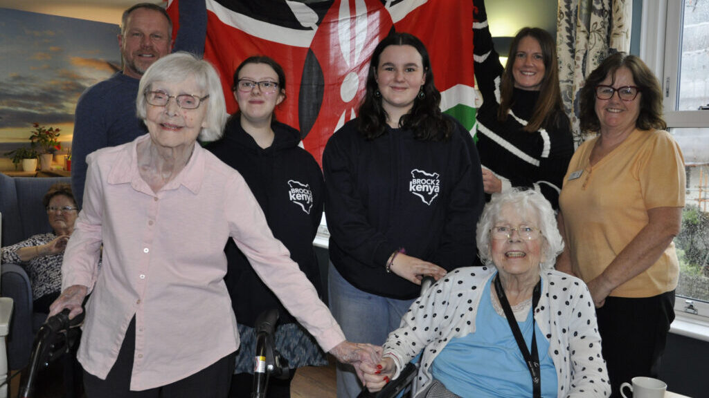 Avon Reach residents, front left and right, Noeleen Braisby and Lillian Ledger, at the presentation by members of the Brock2Kenya group. Behind them are, from left: Adrian Butterworth, trip lead; Brockenhurst College students Bethany Cohu and Lexie Henderson, and volunteers Lorraine Lawrence and Ruth Wildman, who is also Avon Reach home manager
