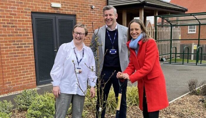 Anchor chief executive, Sarah Jones, managing director of care services, Rob Martin and care minister Helen Whately